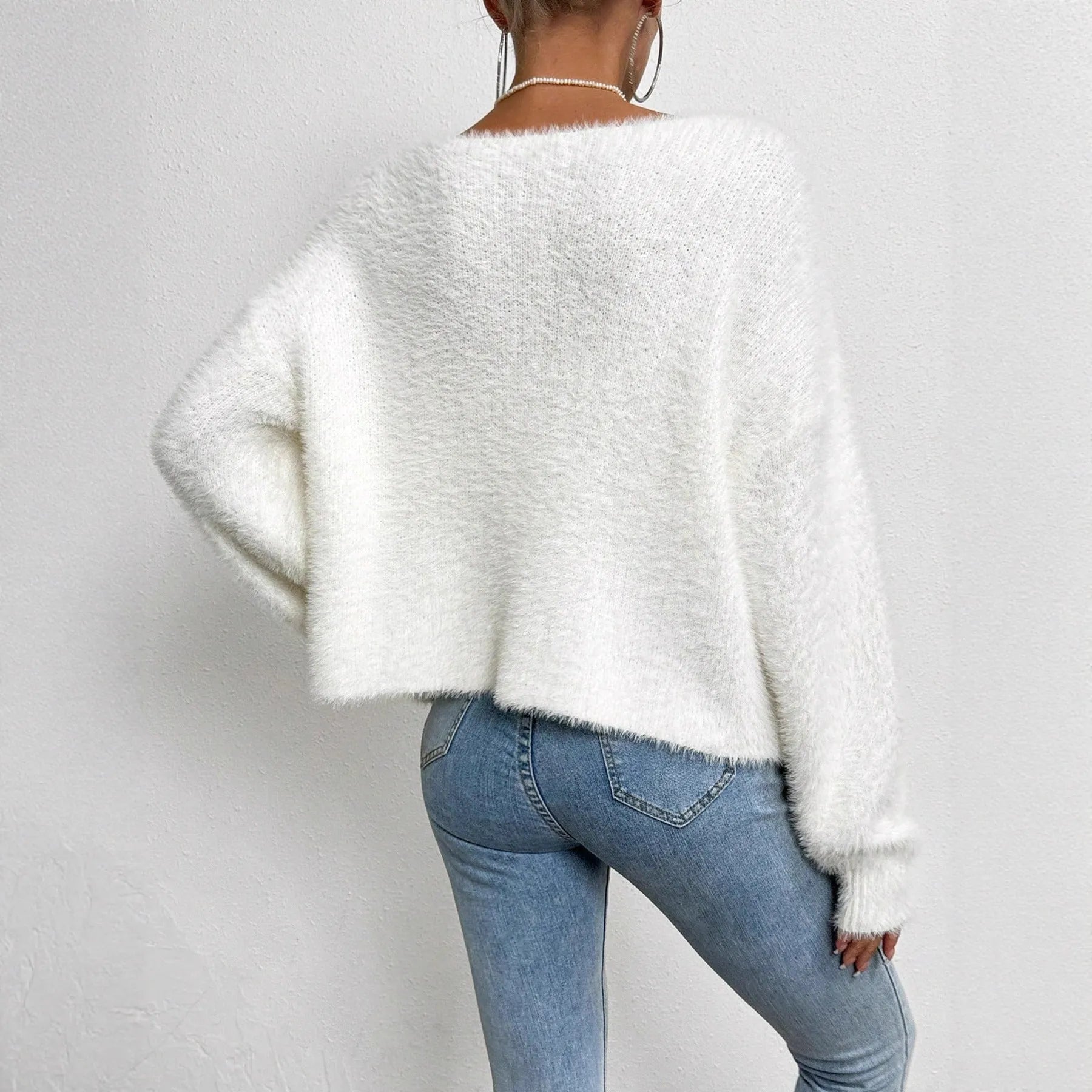 Women's white V-neck cardigan sweater with medium thickness and normal length