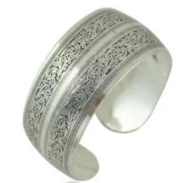 Carved open alloy bracelet with Miao ethnic design in elephant or turtle colour finish