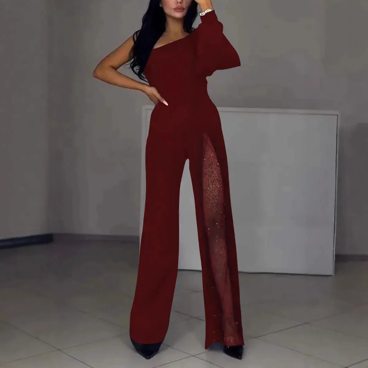 Women's oblique shoulder jumpsuit with high leg slit in polyester fabric for autumn winter wear