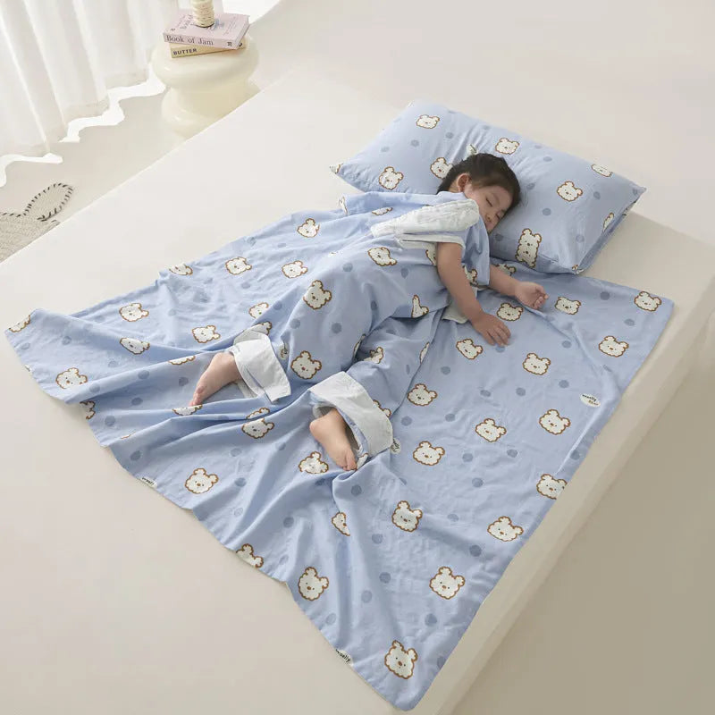 Anti-kick summer blanket in a choice of colours and sizes on a bed.
