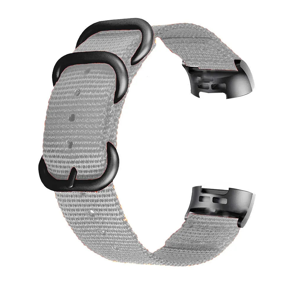 Fitbit Charge nylon replacement watch strap with a three-ring metal buckle shown in Army Green colour.
