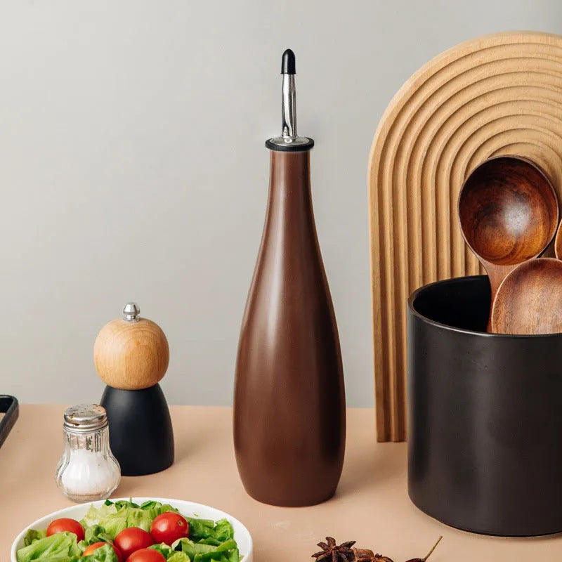 Ceramic oil pot with 650ml conical funnel and integrated pouring brush in black, coffee, or white finish