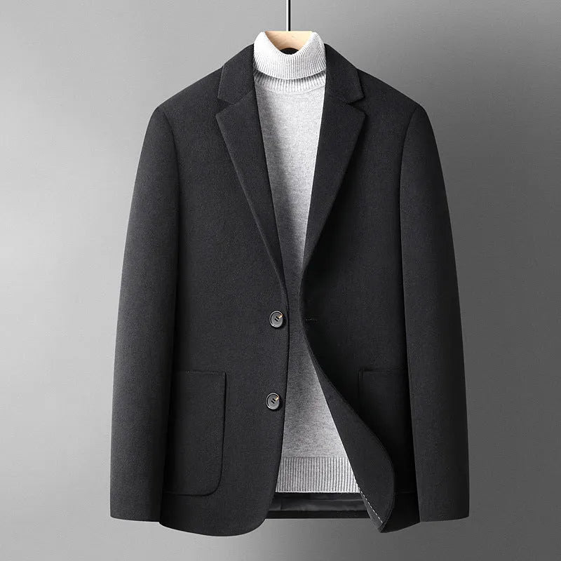 Men's slim fit solid colour wool suit jacket on a hanger, showing non-ironing finish and polyester lining detail.