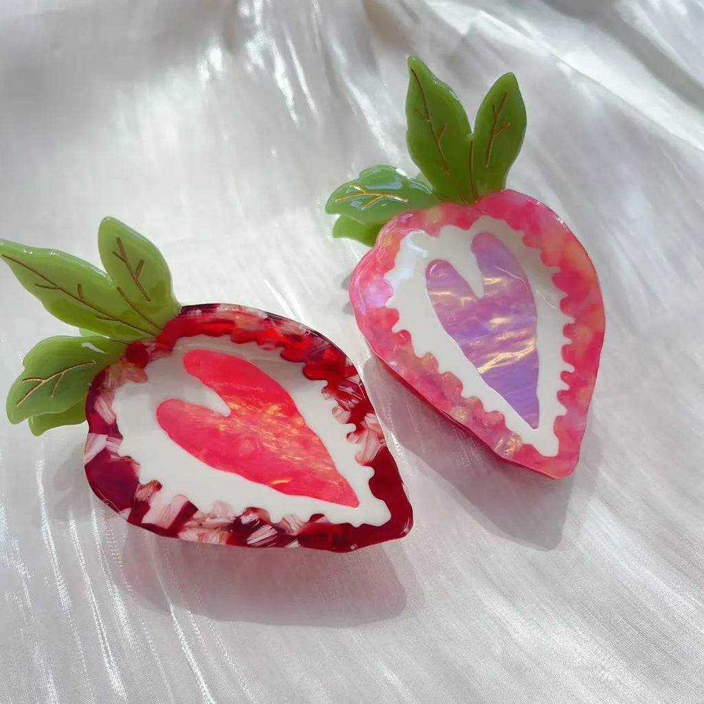 Red strawberry hairpin with manual craftsmanship on a white background