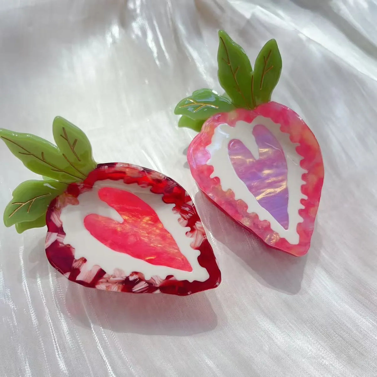 Red strawberry hairpin with manual craftsmanship on a white background