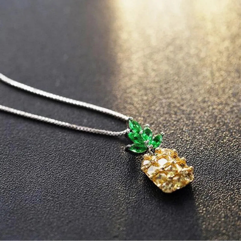 Korean fashion women's necklace with geometric pineapple fruit design and diamond elements in silver white gold colour