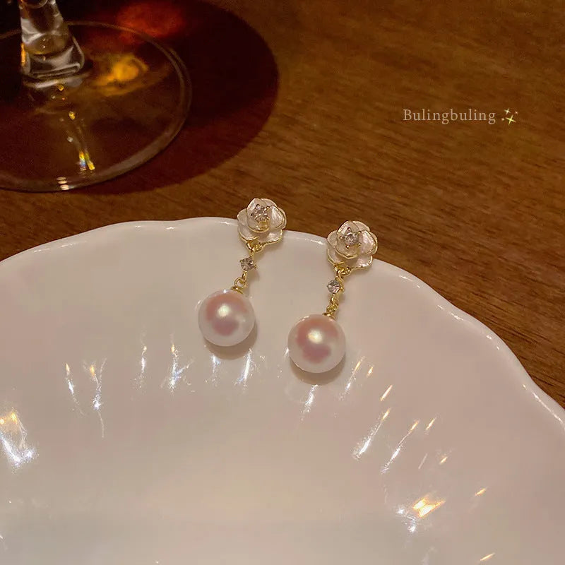 Camellia flower stud earrings for women with alloy construction and floral design
