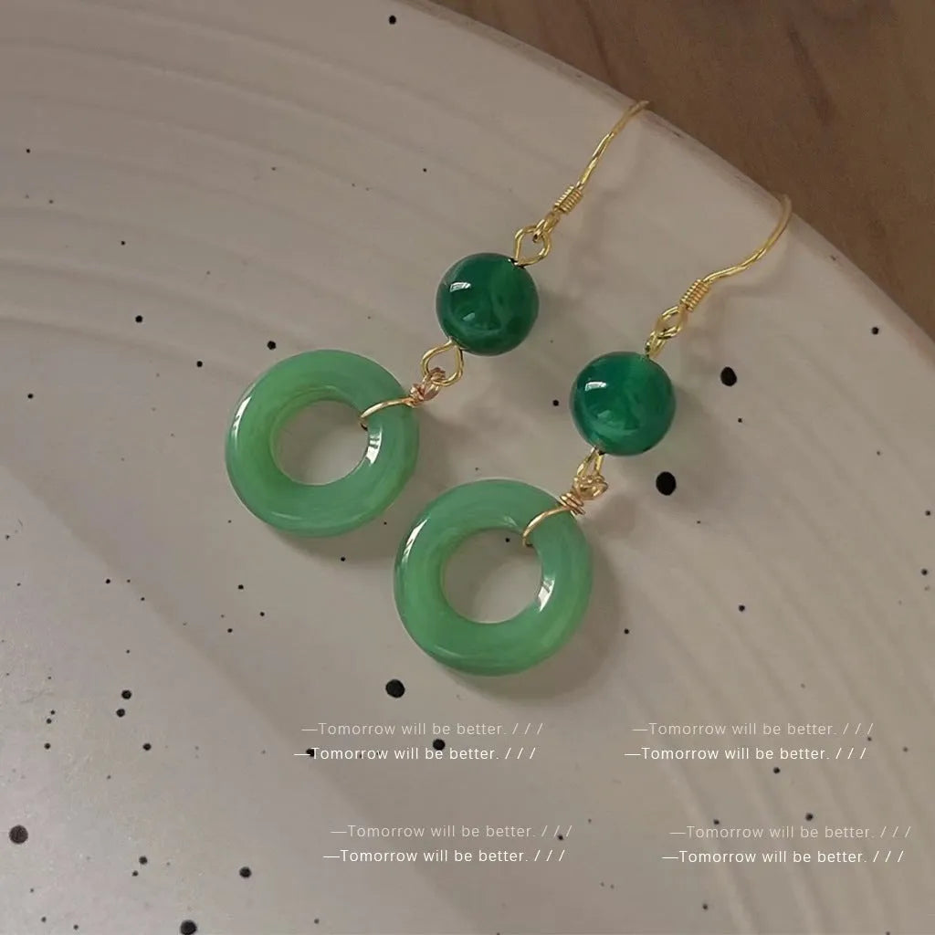 Pair of Chinese style geometric peace buckle earrings with green jade colour and gold plating