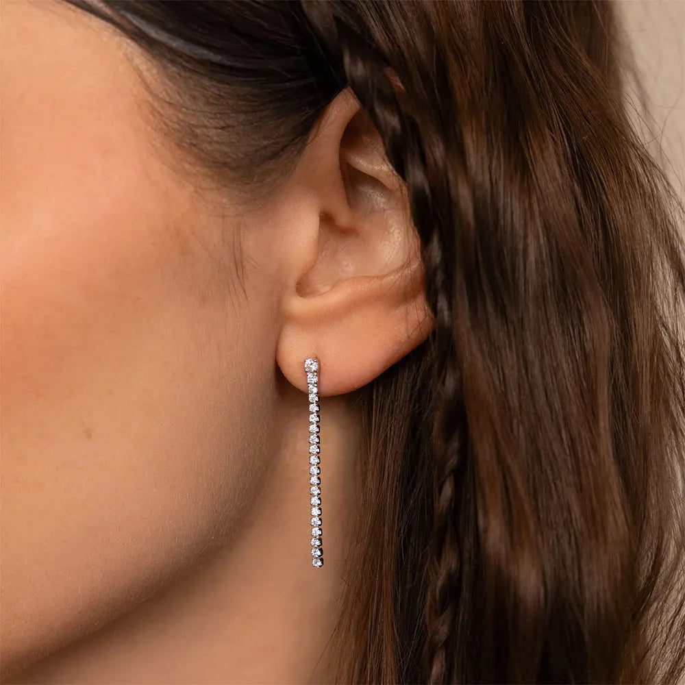Sweet Elegance women's geometric zircon earrings in stainless steel, shown in gold and steel colour options.