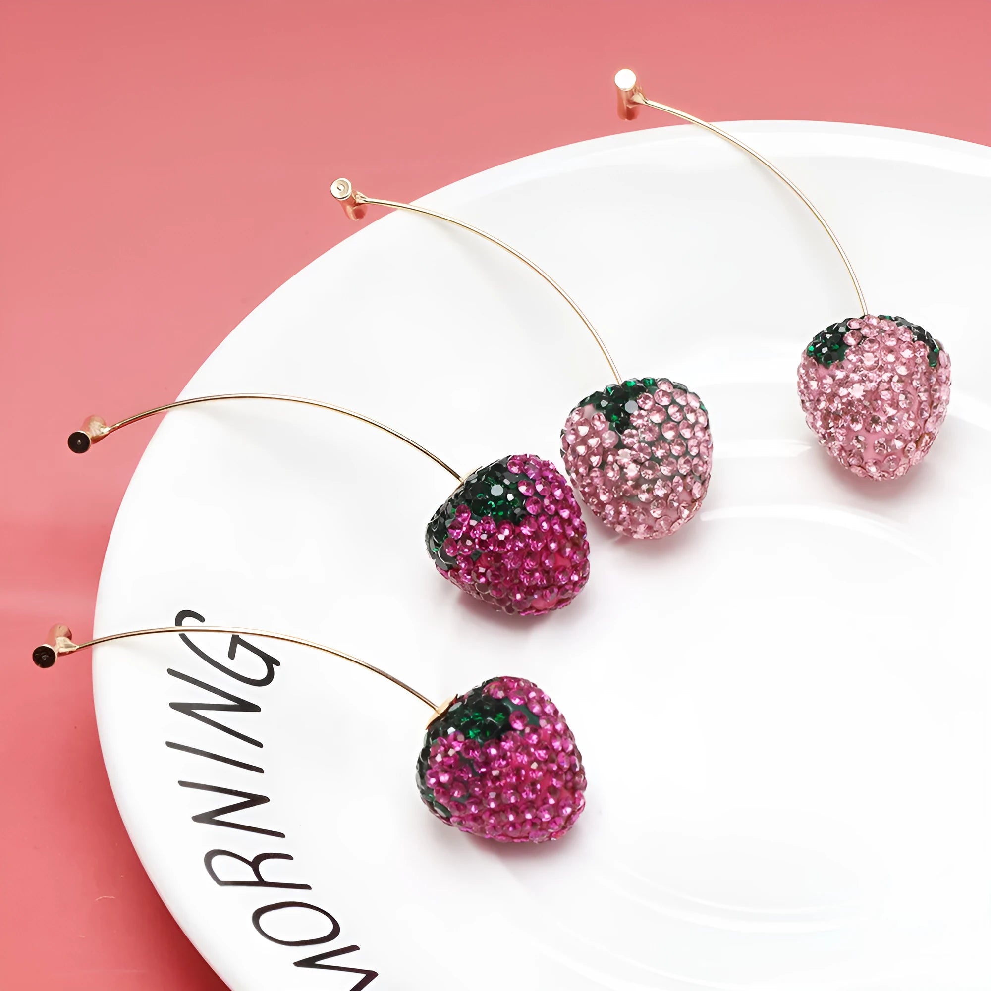 Geometric strawberry-shaped zinc alloy earrings for women in six colour options with spot drill texture.