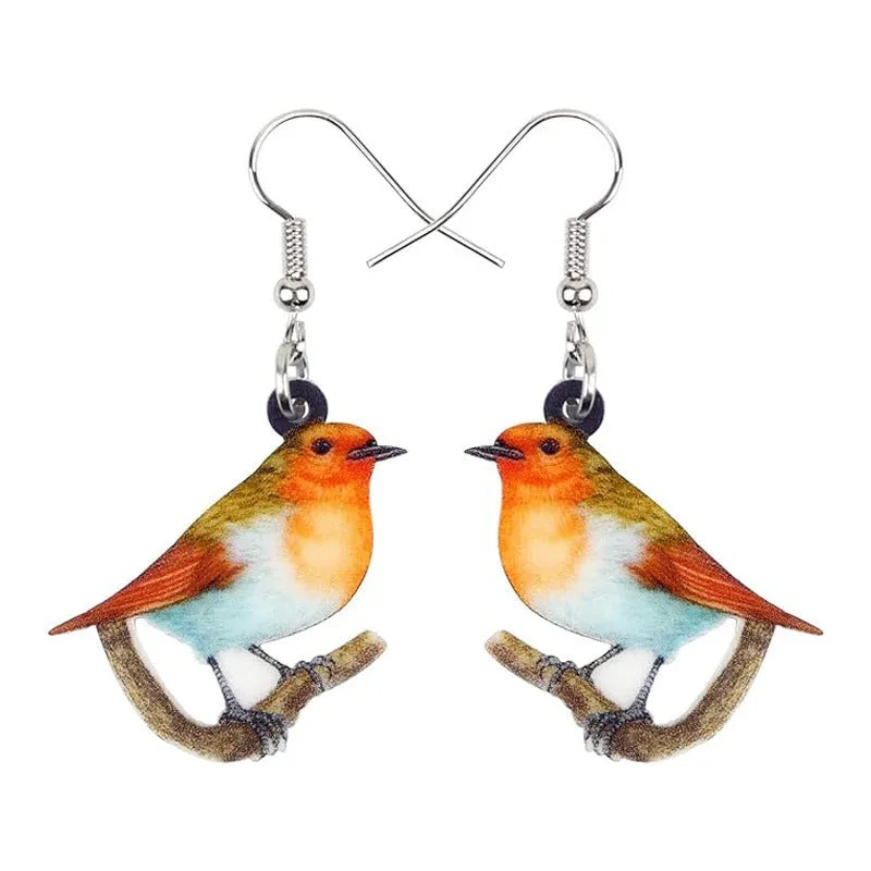 Blue titmouse pendant earrings printed on clear acrylic with animal geometry and snake design elements