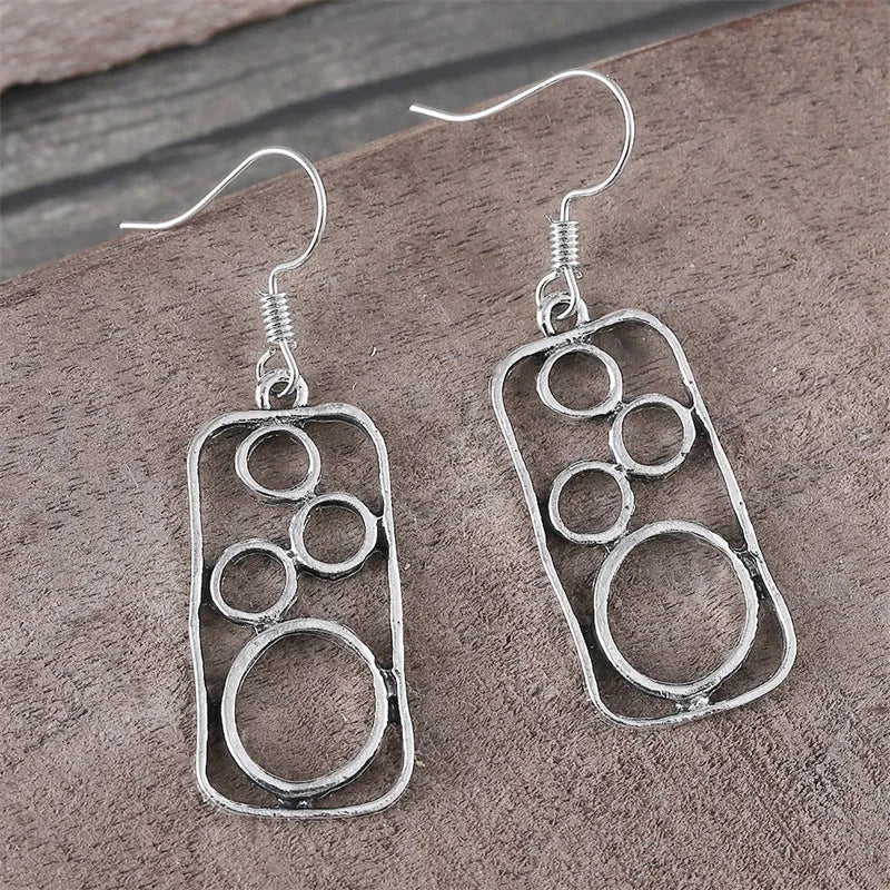 Geometric round ring earrings with irregular square design in antique silver finish