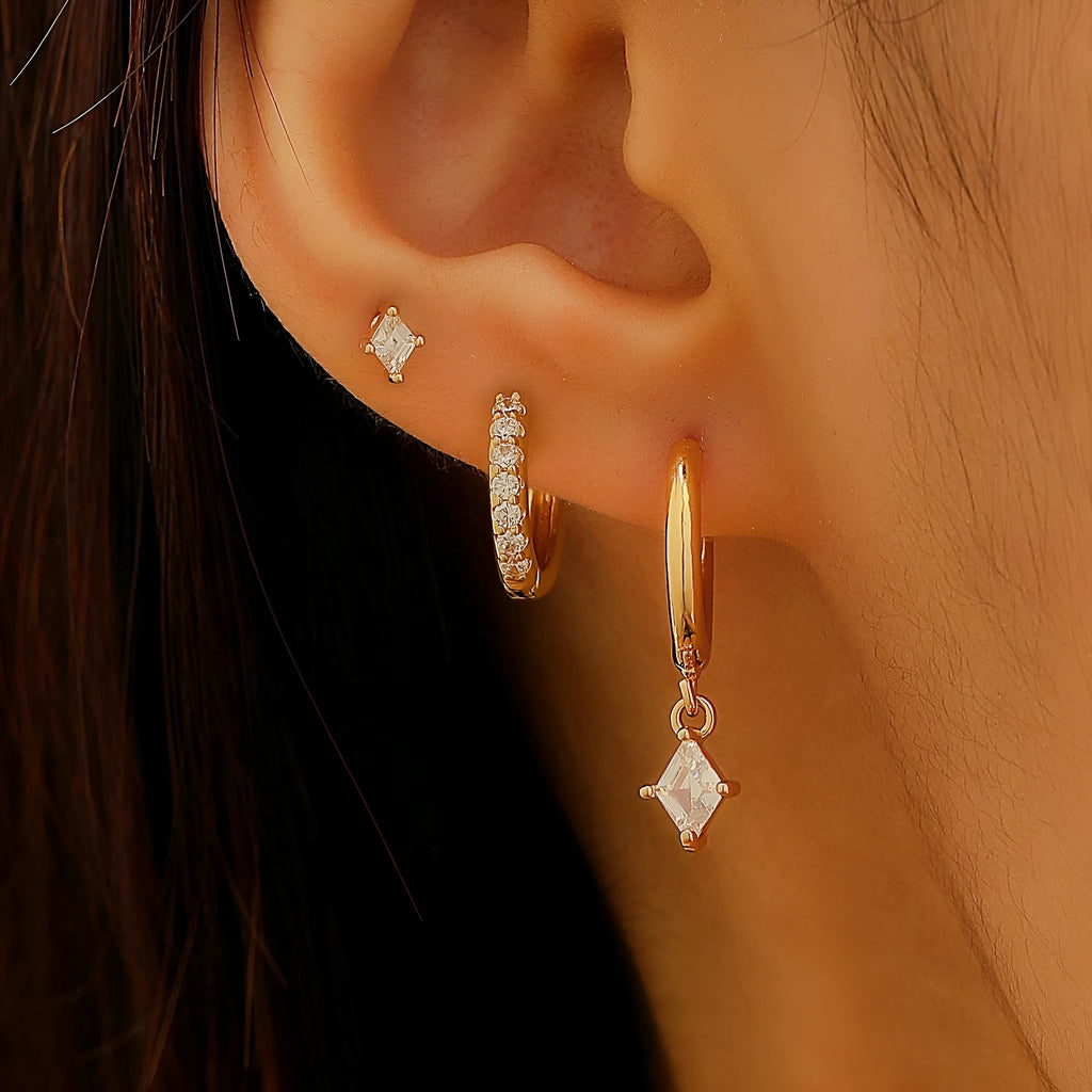 Ladies geometric jewellery set with zircon stones including pendant, ear clips, and stud earrings in gold or white