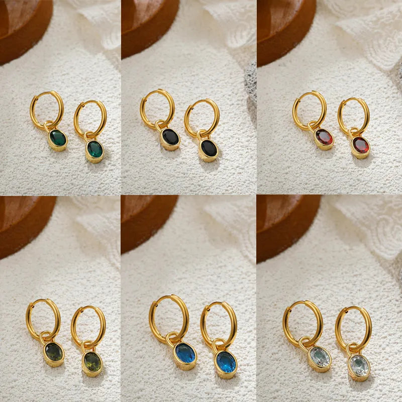 Women's retro simple oval zircon earrings in copper, showing the elliptical design on a model.