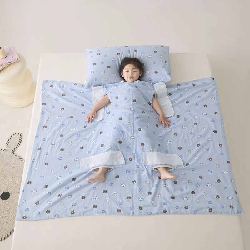 Anti-kick summer blanket in a choice of colours and sizes on a bed.