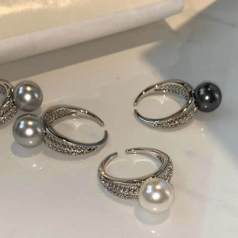 Adjustable opening copper ring with geometric shape and black pearl accents for women