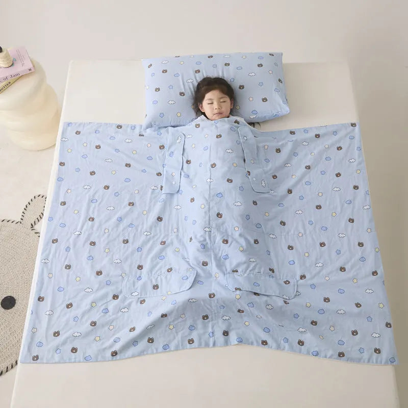 Anti-kick summer blanket in a choice of colours and sizes on a bed.