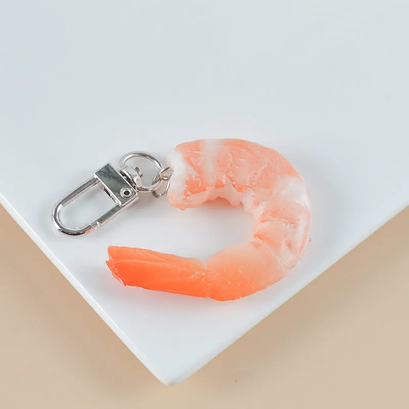 Simulation seafood shrimp keychain made of PVC with 1.5cm thickness functioning as a bag pendant