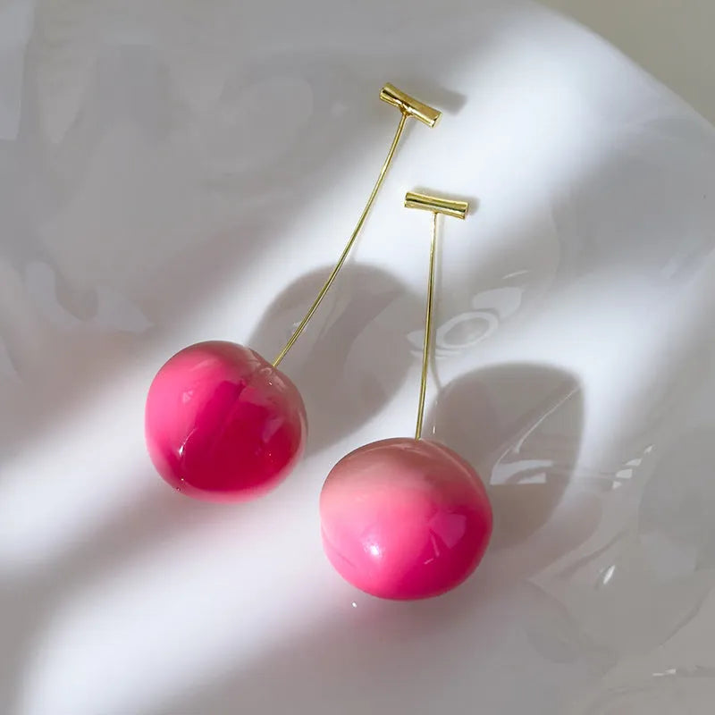 Acrylic peach fruit earrings with copper hooks in small and large size variations