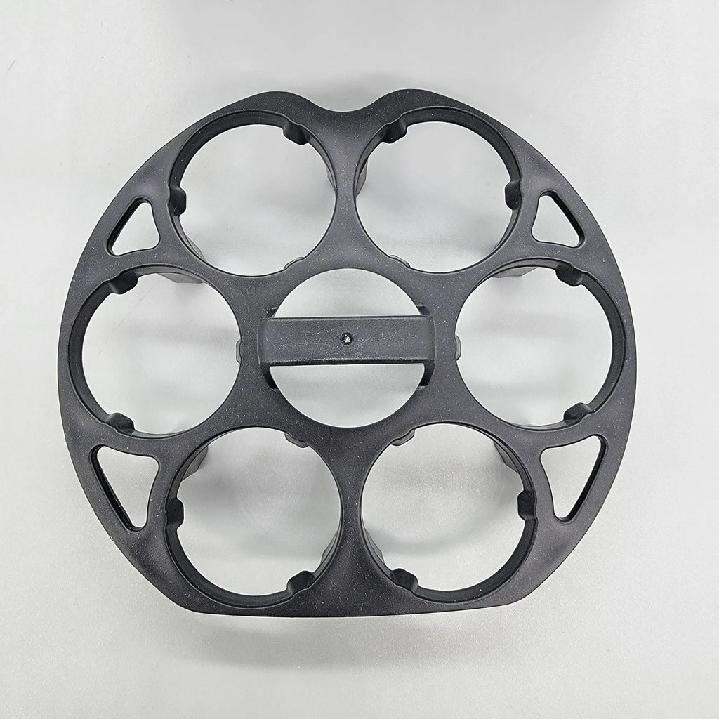 Black plastic egg holder basket measuring 13.8 by 12.6 by 5.7 centimetres