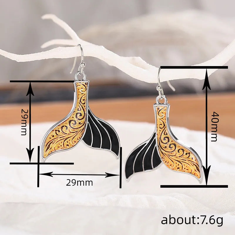 White gold colour fishtail earrings with retro whale design for women