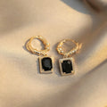 Geometric quadrilateral copper earrings with black zircon crystals in French court retro style