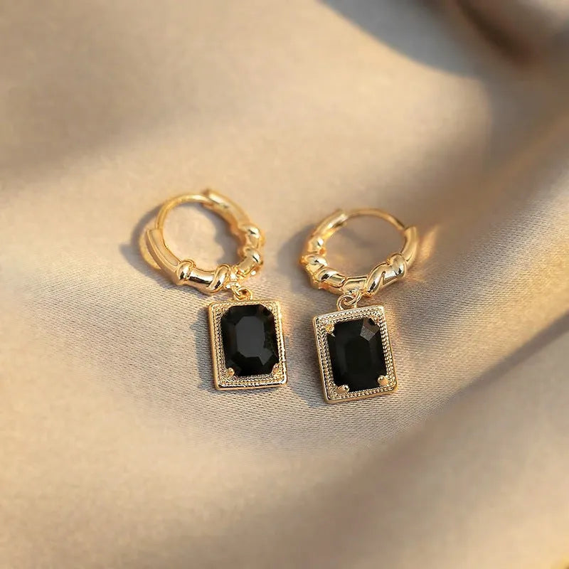 Geometric quadrilateral copper earrings with black zircon crystals in French court retro style