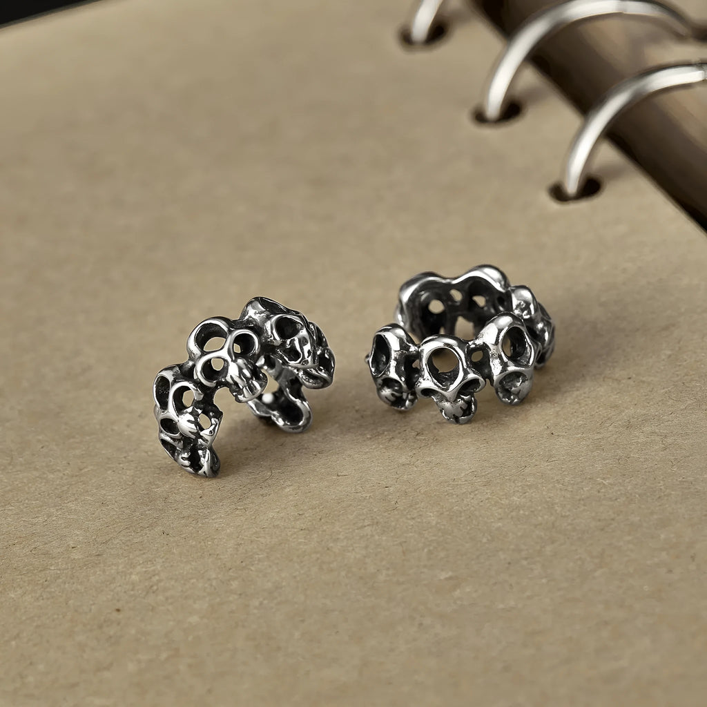 Stainless steel retro hollow skull design earrings with clip fastening