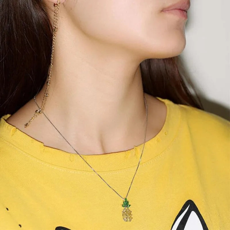 Korean fashion women's necklace with geometric pineapple fruit design and diamond elements in silver white gold colour