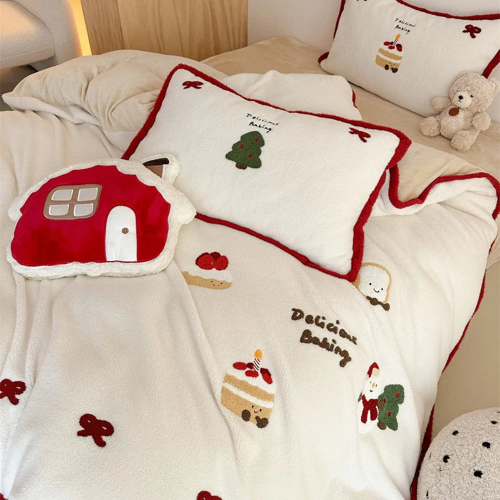 Snowman Milk Pastry cartoon print bedding four-piece set including sheet, duvet cover, and pillowcases on a bed.