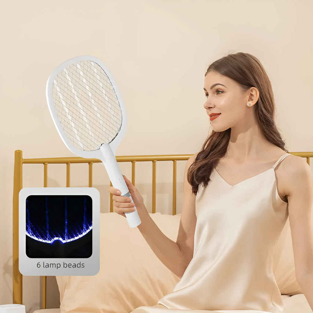 Rechargeable electric mosquito swatter with ABS plastic shell in hand.