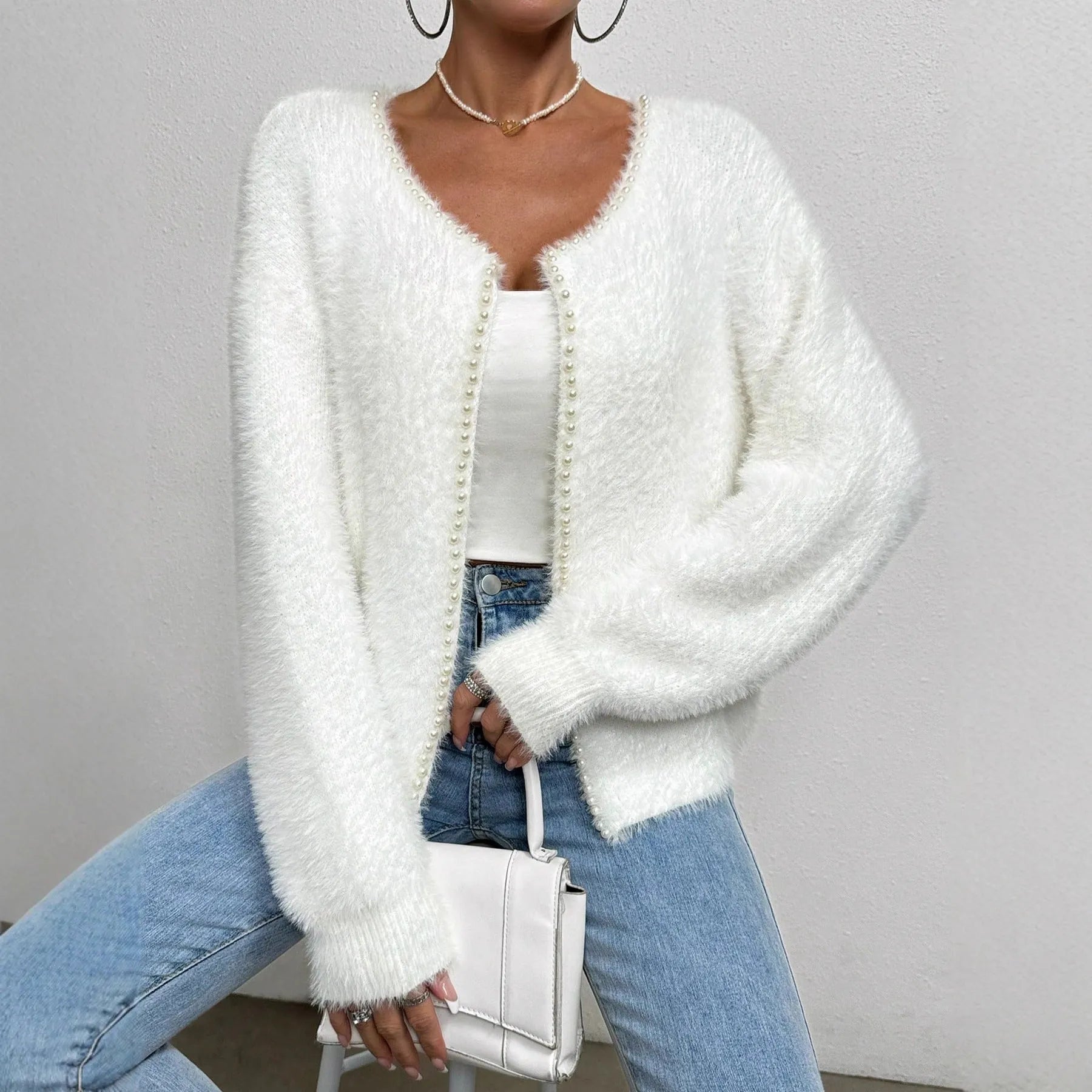 Women's white V-neck cardigan sweater with medium thickness and normal length