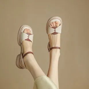 Women's khaki chunky heel platform sandals with open toe and renewable leather upper.