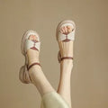 Women's khaki chunky heel platform sandals with open toe and renewable leather upper.