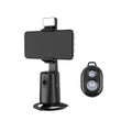 Black desktop mobile phone holder with ribbon lights and remote control for face tracking.