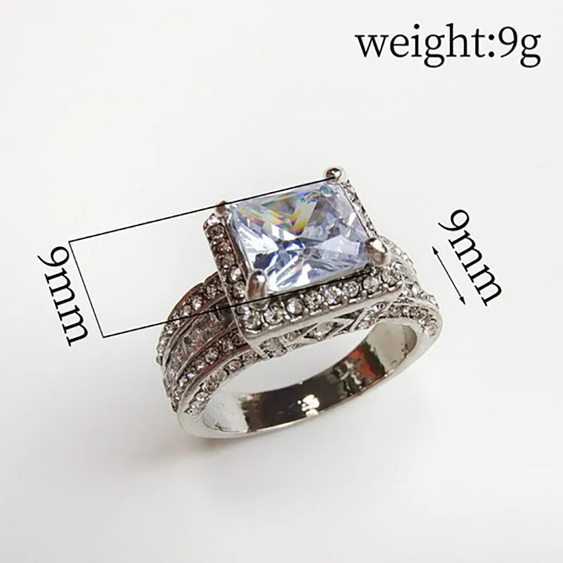 Women's geometric round alloy ring with electroplated gold or white finish