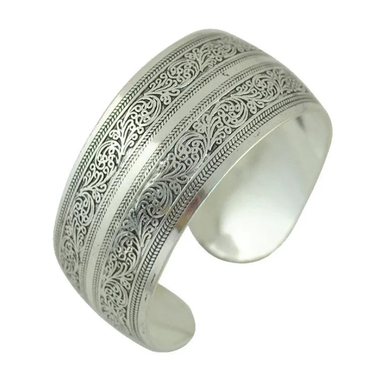 Carved open alloy bracelet with Miao ethnic design in elephant or turtle colour finish