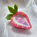 Red strawberry hairpin with manual craftsmanship on a white background
