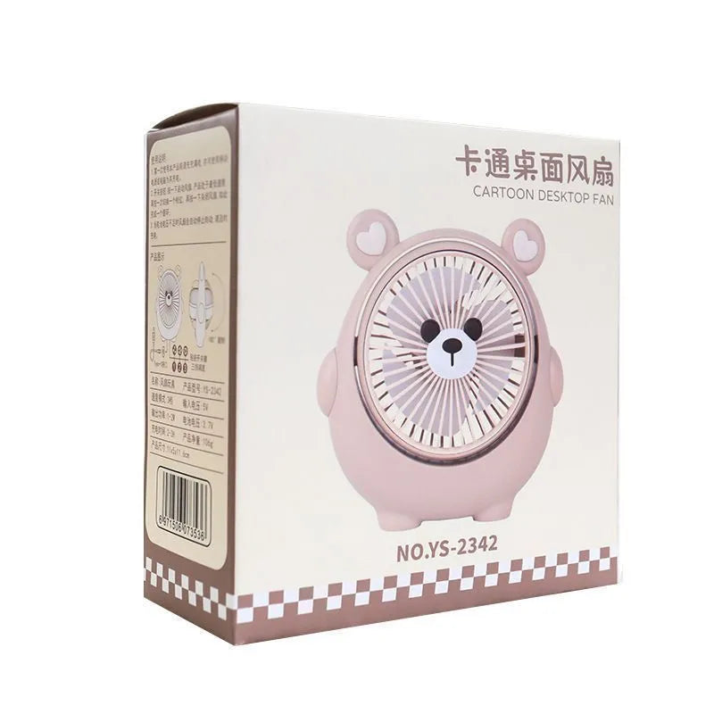 Cute puppy-themed USB desktop electric fan in various colours on a desk.