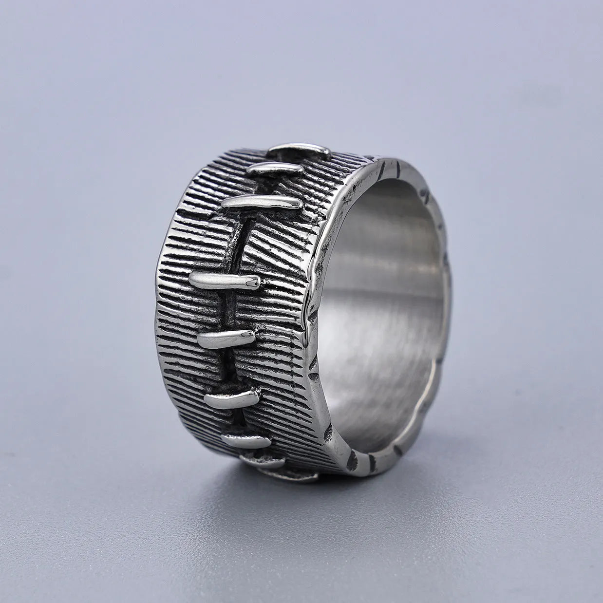 Geometric U-shaped titanium steel punk ring with double-ring construction in dark retro colour.
