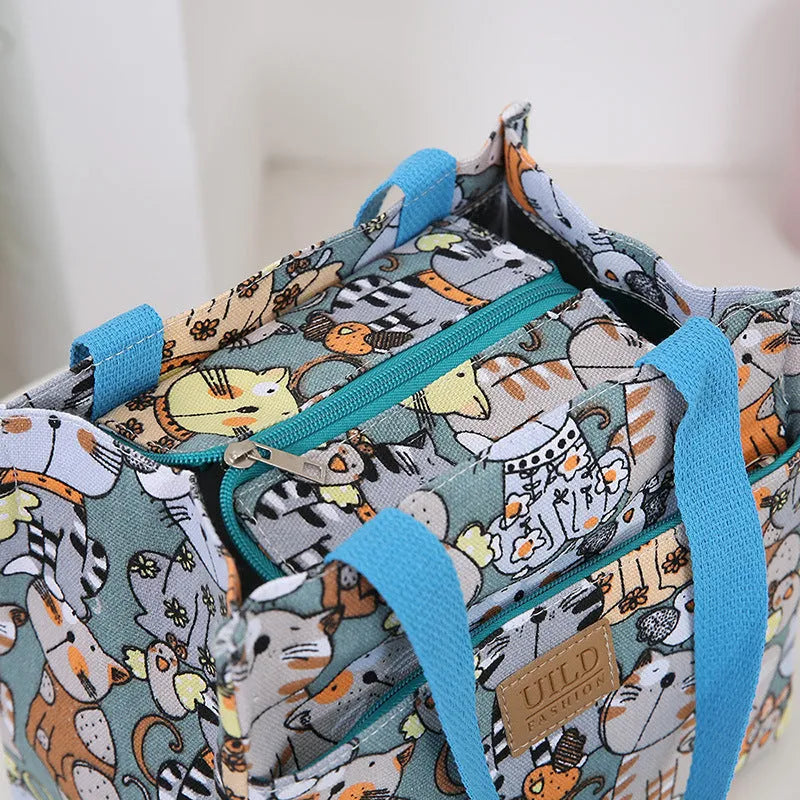 Women's large canvas handbag with aluminium base showing floral print option