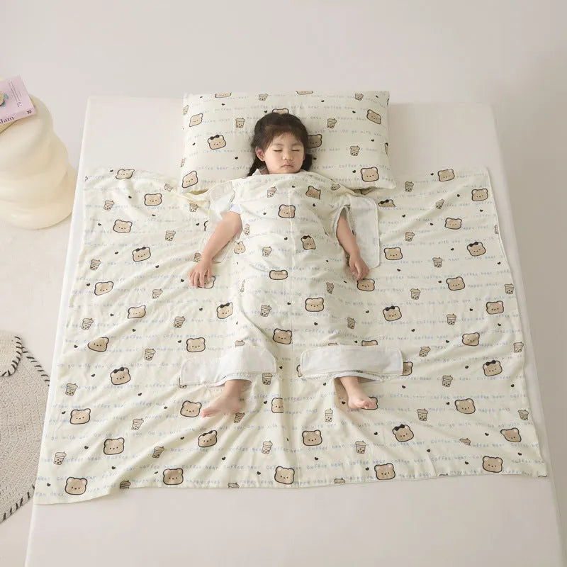Anti-kick summer blanket in a choice of colours and sizes on a bed.
