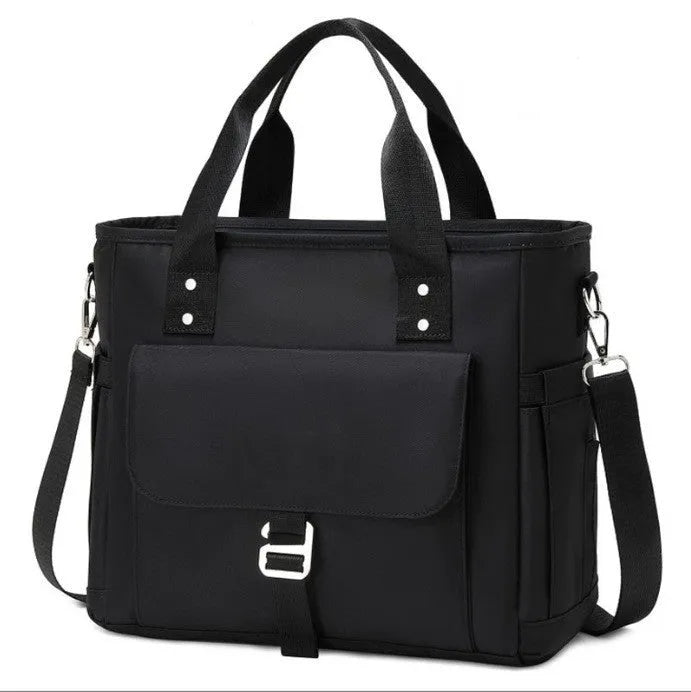 Portable cube-shaped thermal picnic bag with a removable shoulder strap and side pocket.