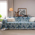 American country style jacquard sofa cover in a thick fabric, shown on a sofa.