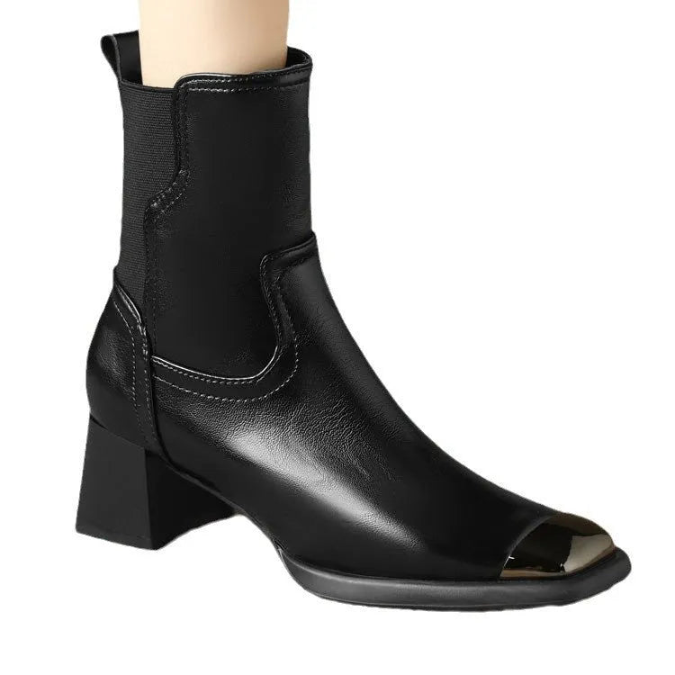 Women's brown and black slimming Martin ankle boots with side zipper and decorative metal details.