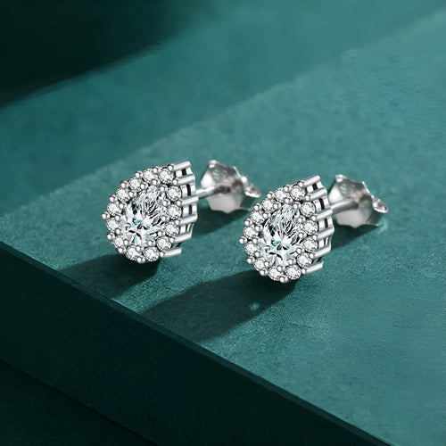 Women's silver water drop stud earrings crafted from 925 sterling silver with diamond treatment