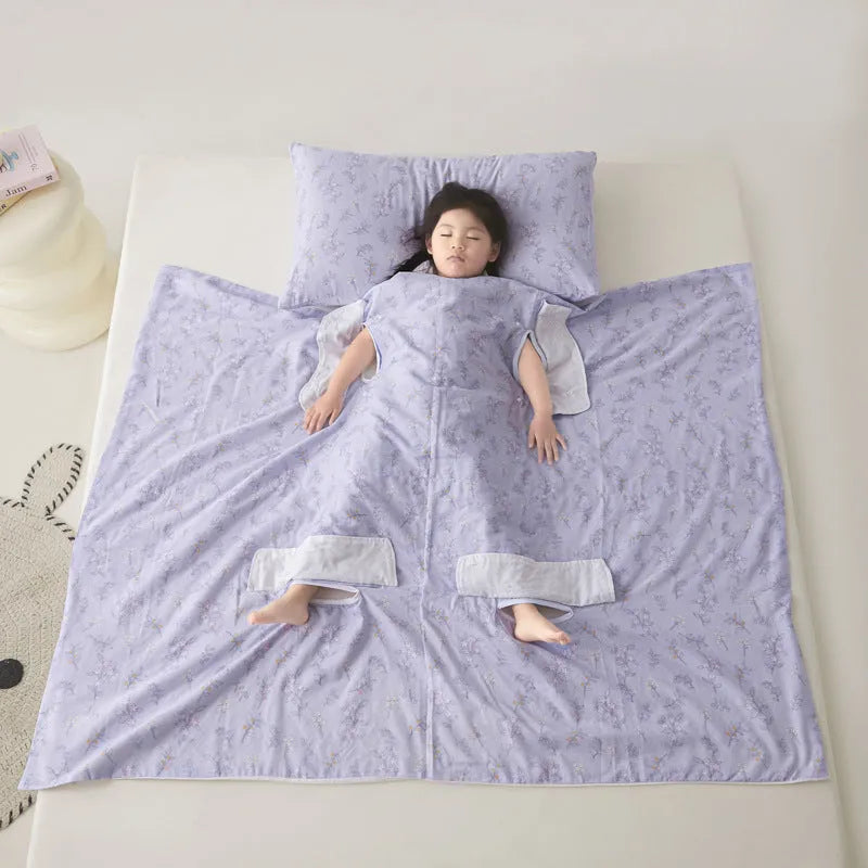 Anti-kick summer blanket in a choice of colours and sizes on a bed.