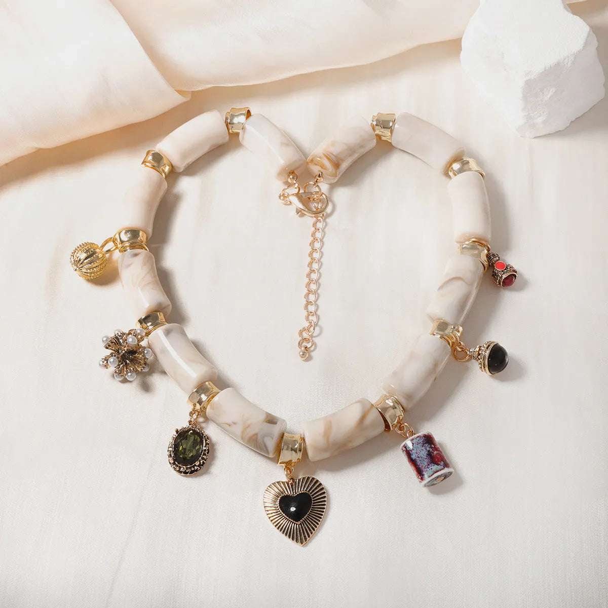 Heart-shaped resin and bamboo pendant necklace with electroplated chain