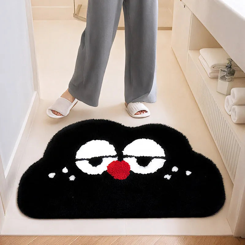Colourful cartoon anime print bathroom mat with a soft cashmere-like texture on a bathroom floor.