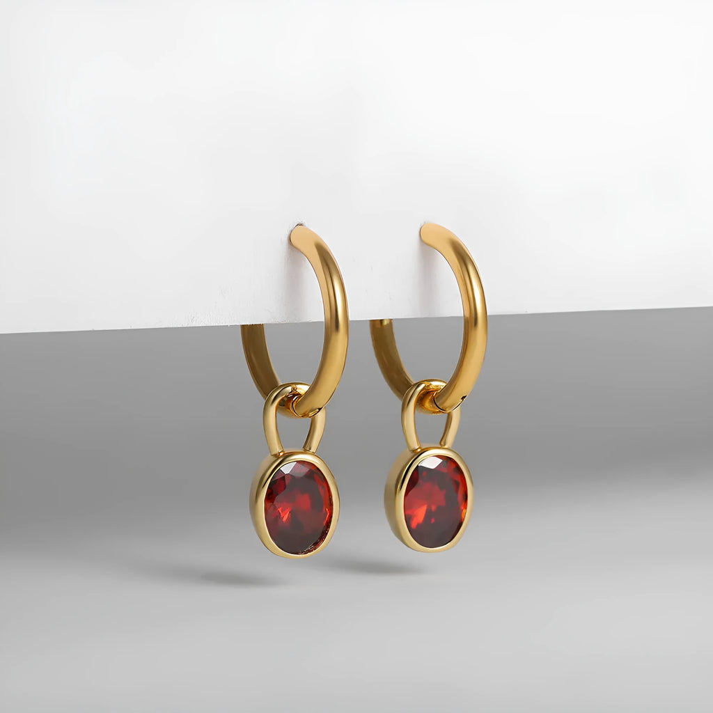 Women's retro simple oval zircon earrings in copper, showing the elliptical design on a model.